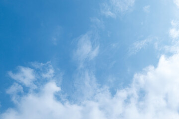 Naklejka na ściany i meble Blue sky background and white clouds soft focus
