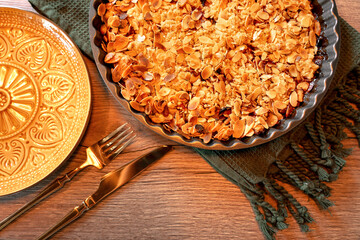 autumn stlye crumble cake flat lay with almond slices