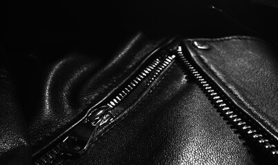 Black leather jacket details. Close-up.