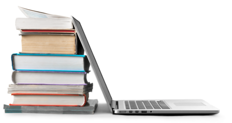 Stack of books with laptop on table