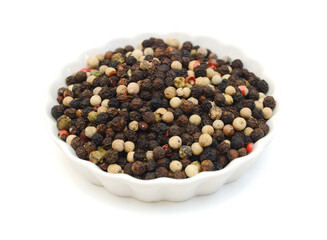 Black peppercorns, isolated on white background 