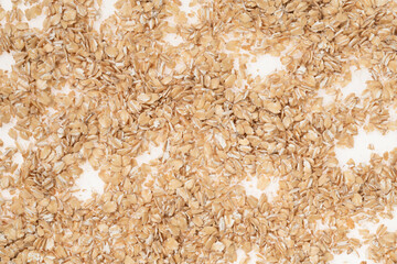 Oat flakes on white background, close up. oatmeal. barley flakes. rolled oat