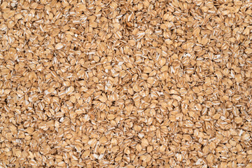 Oat flakes texture background, close up. oatmeal. barley flakes. rolled oat