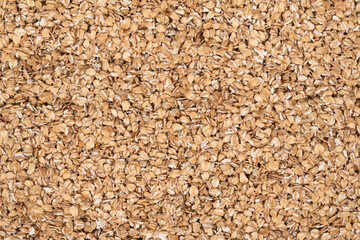 Oat flakes texture background, close up. oatmeal. barley flakes. rolled oat