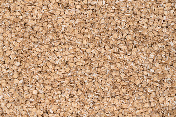 Oat flakes texture background, close up. oatmeal. barley flakes. rolled oat