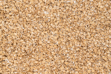 Oat flakes texture background, close up. oatmeal. barley flakes. rolled oat