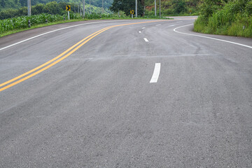 Obraz premium View asphalt road in the forest