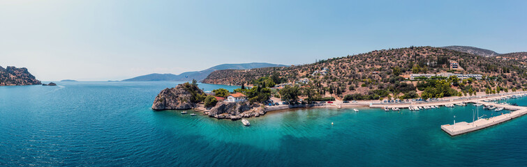 Fototapeta premium Antikyra Greece, aerial panorama. Coastal village boat marina and beach in Boeotia