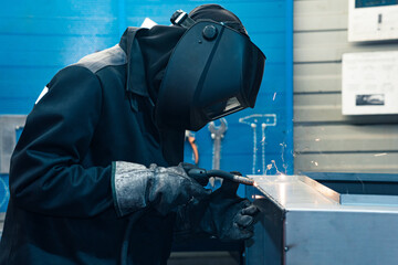 welding of metal structures in workshop