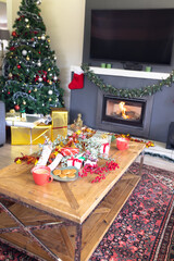 Vertical picture of modern living room decorated with christmas decorations, a christmas tree
