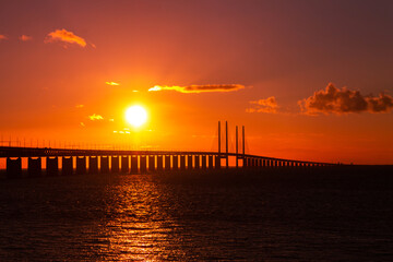 Fototapeta na wymiar Beautiful sunset over the bridge Oresund