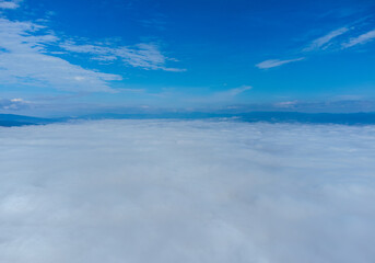 Fototapeta na wymiar Landscape above a layer of fog
