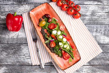 Greek salad, Greek salad on a white background, side and top view