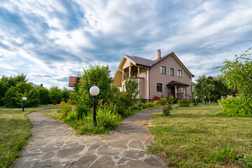 Country house and garden in countryside,Rural landscape .