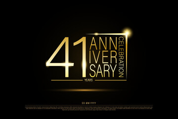 41 years golden anniversary gold logo on black background, vector design for celebration.