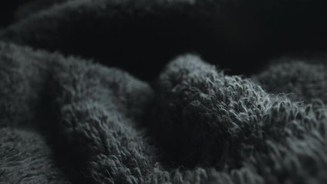 Texture of grey soft terry towel textile.