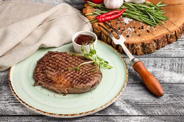 Steak, beef steak, grilled beef on a wooden white background