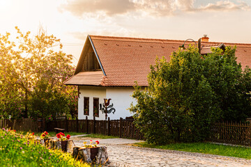Fototapeta na wymiar Cute traditional town in hungary which name is Holloko. Hungarian name is Hollokő (Raven-stone in english) Old houses This place is on the UNSECO site. Famous tourist attraction in this country