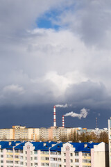 Industrial cityscape, residential area and power plant