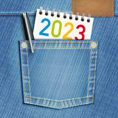 Concept de l’éducation scolaire et du cursus universitaire pour une carte de vœux 2023 avec une poche de blue-jeans et un bloc note comme symbole de la jeunesse.