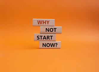 Why not start now symbol. Concept words Why not start now on wooden blocks. Beautiful orange background. Business and Why not start now concept. Copy space.