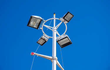 street lamp against the blue sky