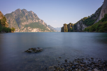 Awesome view of mountains and lake iseo from Riva di Solto,long exposure photo, Baia dal Bogn,Bergamo,Italy.