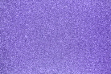 Violet textured glitter background. Shiny sparkly backdrop