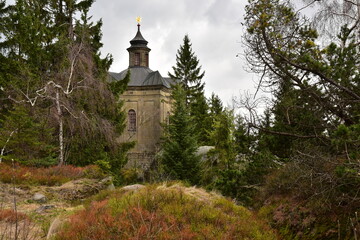 Fototapeta na wymiar Spring view of Chapel of Virgin Mary on Hvezda hill, Broumov area, Broumov, Broumov Walls