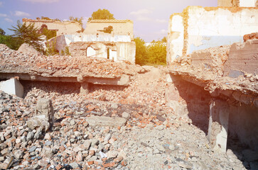 Collapsed industrial multistorey building in daytime