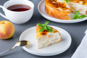 Baked Sweet Cottage Cheese casserole with apple decorated mint