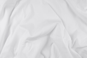Obraz premium White fabric. luxurious white fabric texture background. Creases of satin, silk, and cotton.