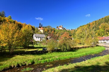 Fototapeta na wymiar Beautiful old castle in the autumn landscape. Colorful nature. Svojanov - Czech Republic.