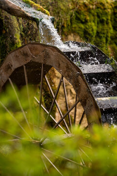 The wooden wheel of an old water mill