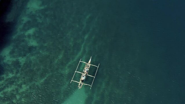 Drone footage of a boat in the ocean in the Philippines