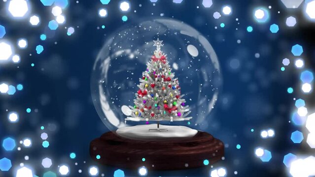 Animation of christmas snow globe with christmas tree on blue background