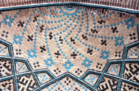 Detail of traditional persian mosaic in arch of Jameh Mosque, Qazvin, Iran