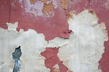Pink wiped wall with traces of plaster