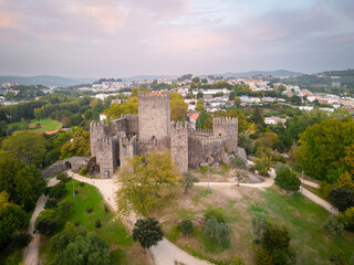Fototapeta na wymiar Aerial views of Guimaraes Castle. Cityscape seen from the air at sunset
