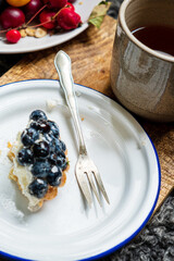 Homemade blueberry tart with soft cheese