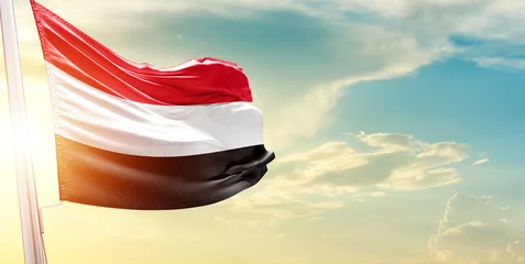 Foto op Plexiglas Yemen national flag cloth fabric waving on the sky - Image © Faraz