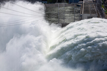 Discharge of water at hydroelectric power plants. Electricity generation. Renewable energy.