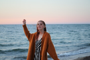 portrait of a beautiful girl by the sea