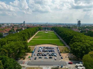 Bird's eye view of the Kasprowicz park of Szczecin in Poland under a cloudy blue sky