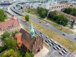 Bird's eye view of a church in Szczecin in Poland under a cloudy blue sky