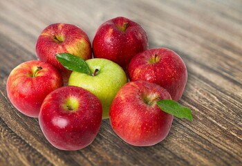 Fresh ripe juicy apple fruits on the desk