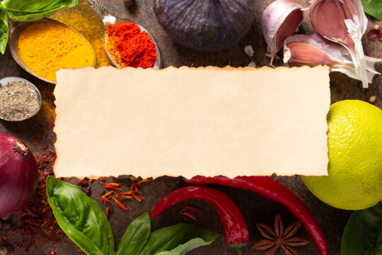 Variety of spices and herbs paper label at table background. Cooking concept and ingredients