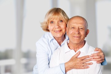 Happy old loving couple posing together