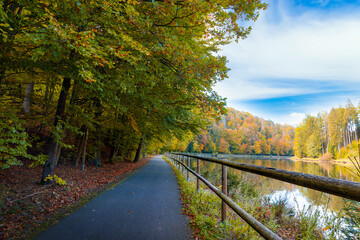 Fototapeta na wymiar Road along the Vltava river in the autumn season.