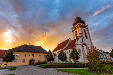Evening above historic center of Bechyne. Old church. Czechia.